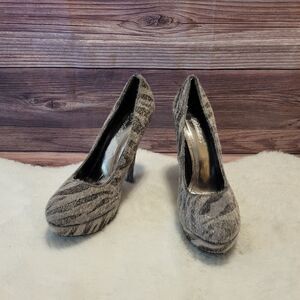 Breckelles Zebra fur print pumps